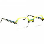 Unisexbrille Johann von Goisern JA024 mit eckigem Rahmen in Gelb, Blau und Schwarz-Weiß-Muster.